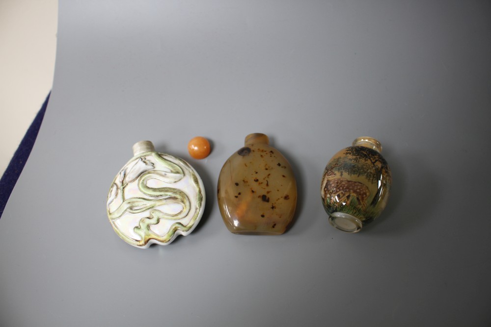 Two Chinese snuff bottles: agate and internally painted glass and a European porcelain scent flask